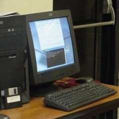 Old desktop computer with a CRT monitor and 3.5in floppy diskette